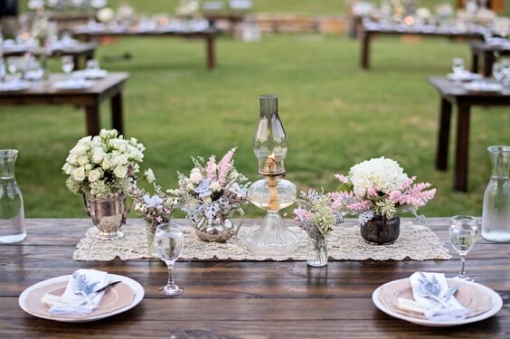 Table decorations for Blush and dusty blue wedding